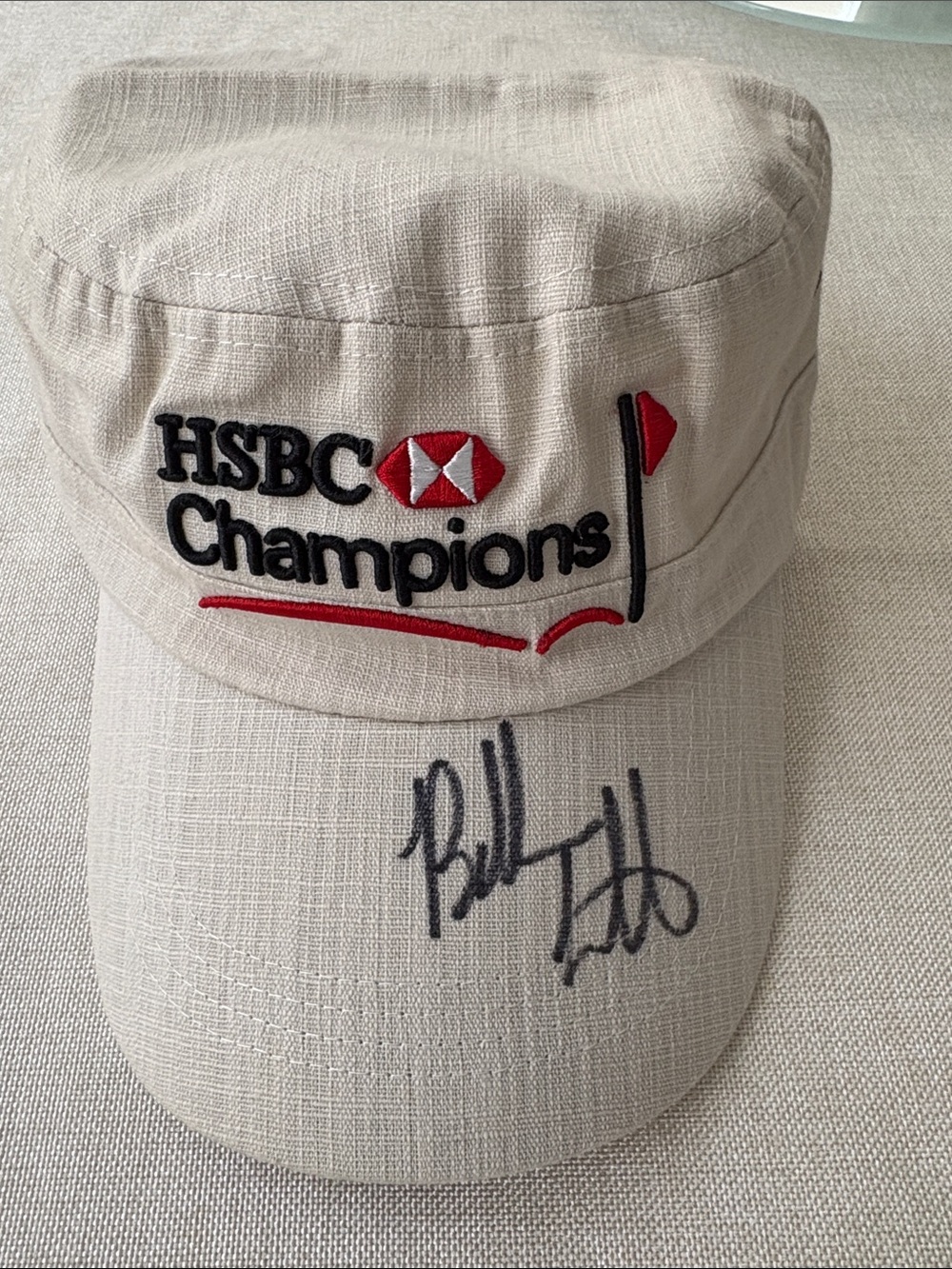Bubba Watson Signed - HSC Champions Beige Golf Cap by World Golf Championships.